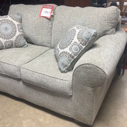 Brand new, two piece living room, group sofa and loveseat for $1200 brand new