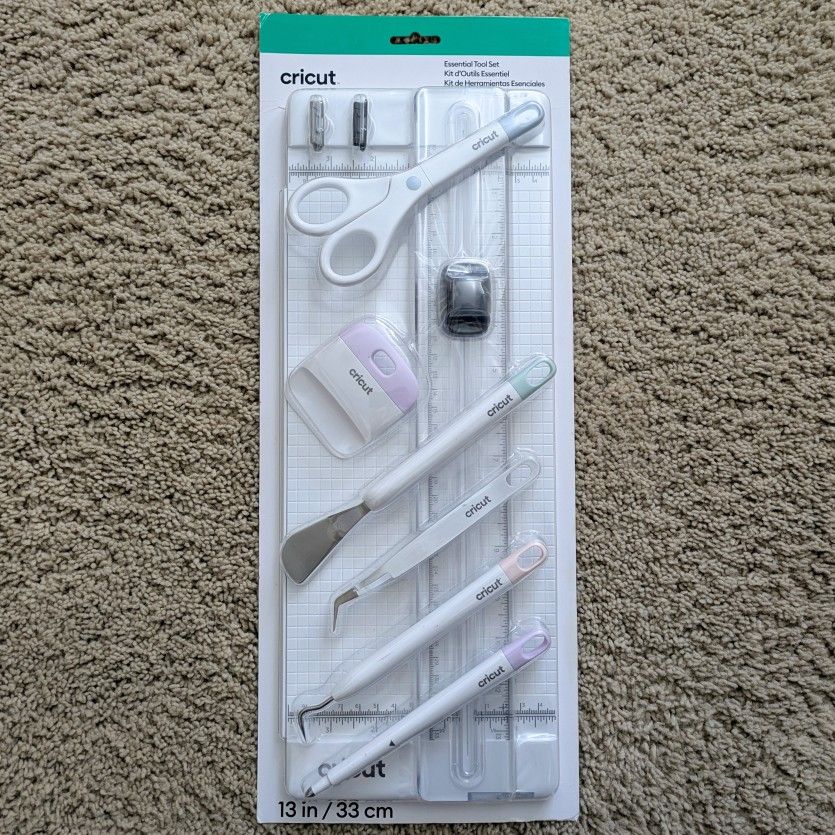 NEW Cricut Essential 7 piece tool set with trimmer scoring blade stylus tweezers spatula scissors