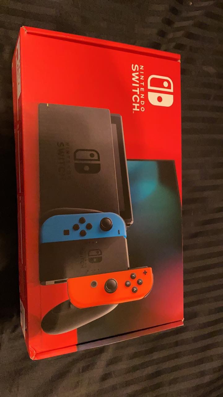 Nintendo Switch Console with Neon Blue & Red Joy-Con.