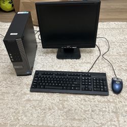 computer with monitor, keyboard, and mouse
