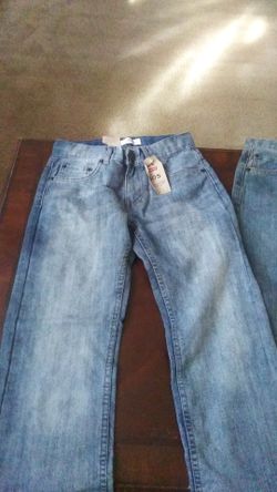 I m selling 2 pairs of boy jean size 10 REG with the tags still on it