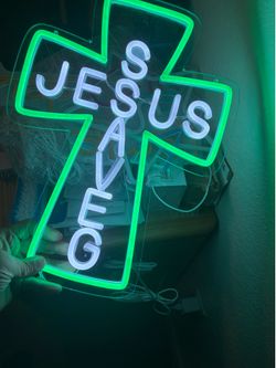 Jesus saves neon light sign