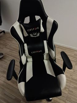 black in white gaming rolling chair