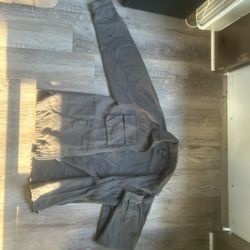 Brown vintage jacket with a worn l