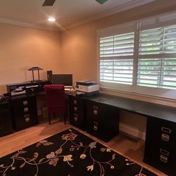 Ballard designs black modular desk - solid wood. Has 7 file cabinets and 5 drawers and charging deck Computer,printer lamp not included