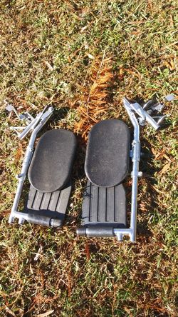 Wheelchair leg and feet attachments