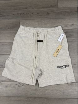 white essentials shorts size XL