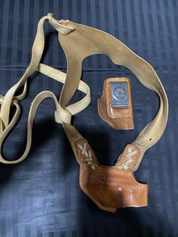 25 Auto Shoulder Holster and boot holster.