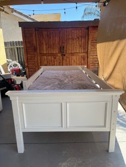 Twin bed with mattress and frame