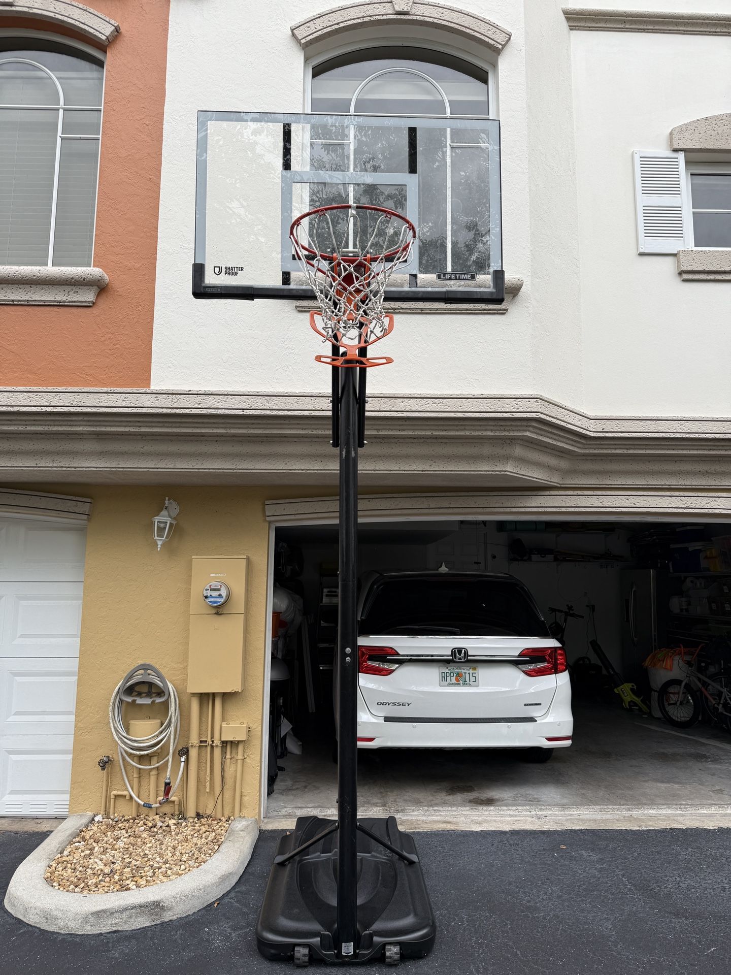 Lifetime 55 Inch Steel Frame Shatterproof Portable Action Grip Adjustable Basketball Hoop