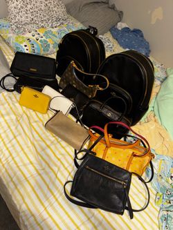 Tory Burch, Kate Spade, Coach, Marc Jacobs, Dooney & Burke purse