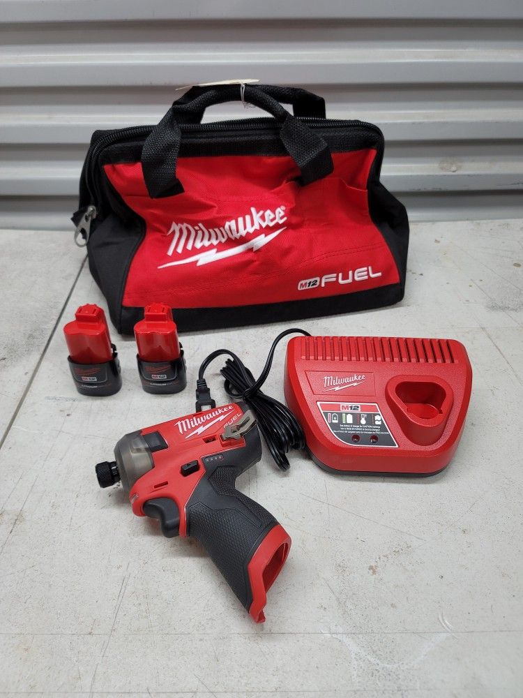 Milwaukee M12 fuel SURGE 1/4 hex impact driver impacto destornillador 2 2.0ah batteries and charger