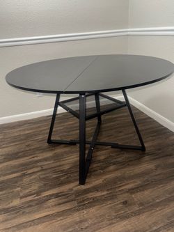 Black Round Dining Table with Metal Base