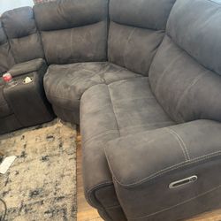 power reclining sectional with a center console.