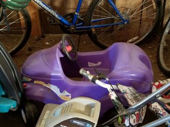 Purple pedal car