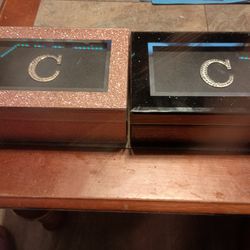 Two Jewelry Boxes With The Letter C On It