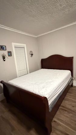 Queen bed with mattress and box springs $525
