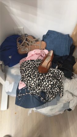 A few bags of women’s clothes and shoes