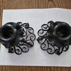Pair of black candle holders