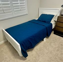 Twin Bed with Mattress and Free Bedding