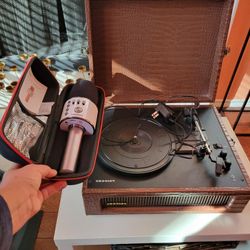 Crosley portable record player and Bonaok wireless mic karaoke.  Both work great!