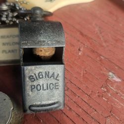 Vintage keychain with whistles