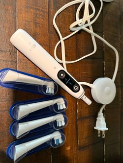 Oral B iO electric toothbrush and replacement heads