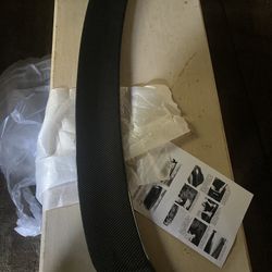 New carbon fiber rear trunk spoiler