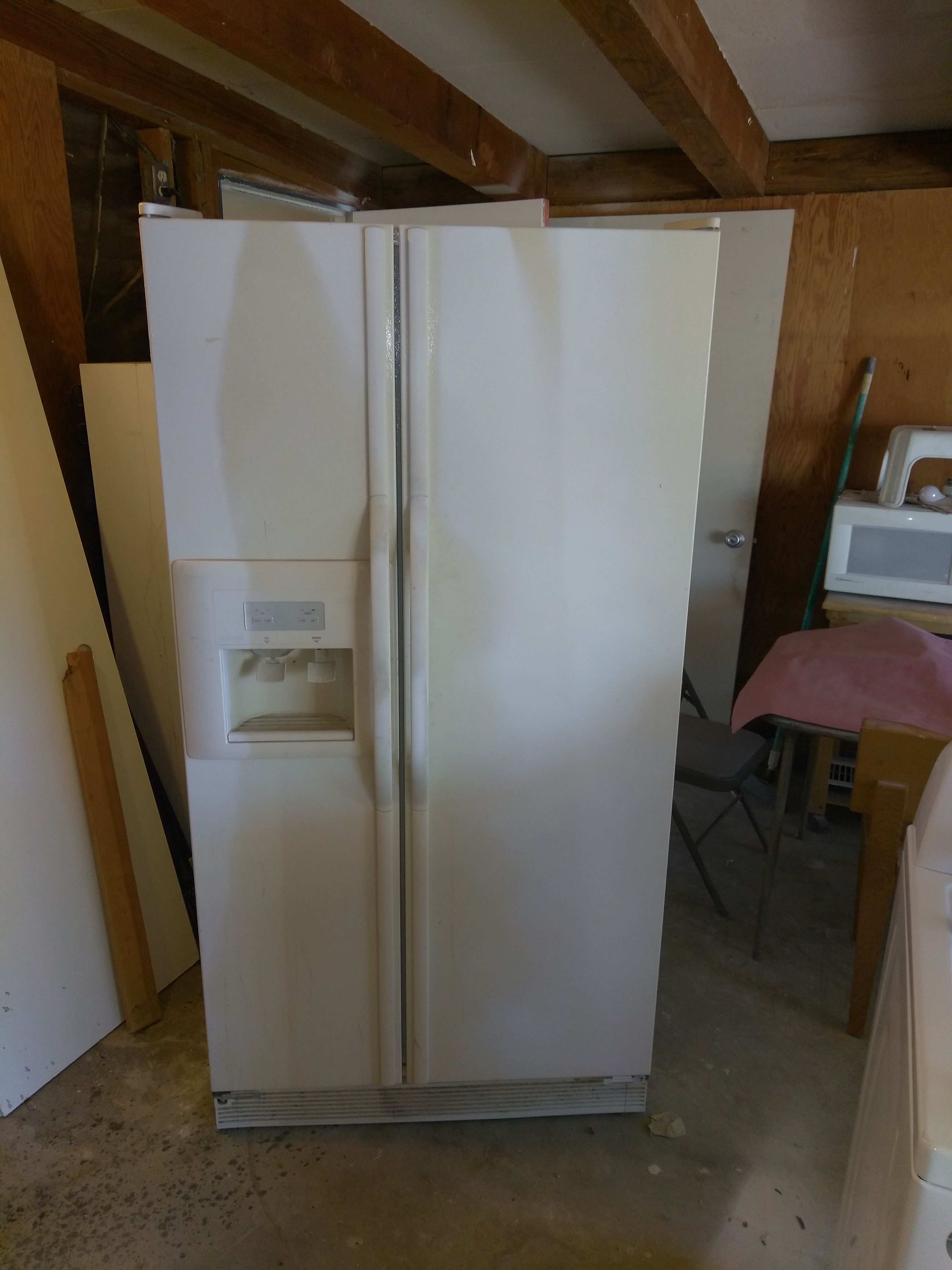 Kenmore side by side refrigerator.