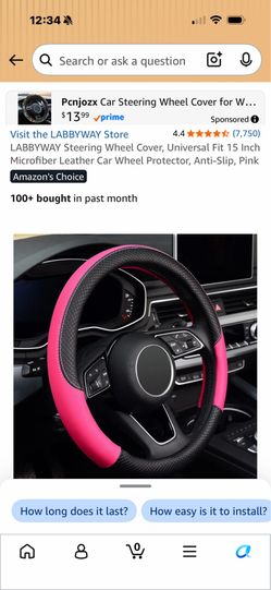 Pink and black steering wheel cover