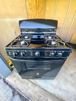 GE gas stove 4 burners black color 30”