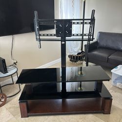 TV console with stand to the TV