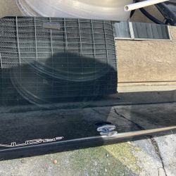 Glass door for a camper shell Ford F150