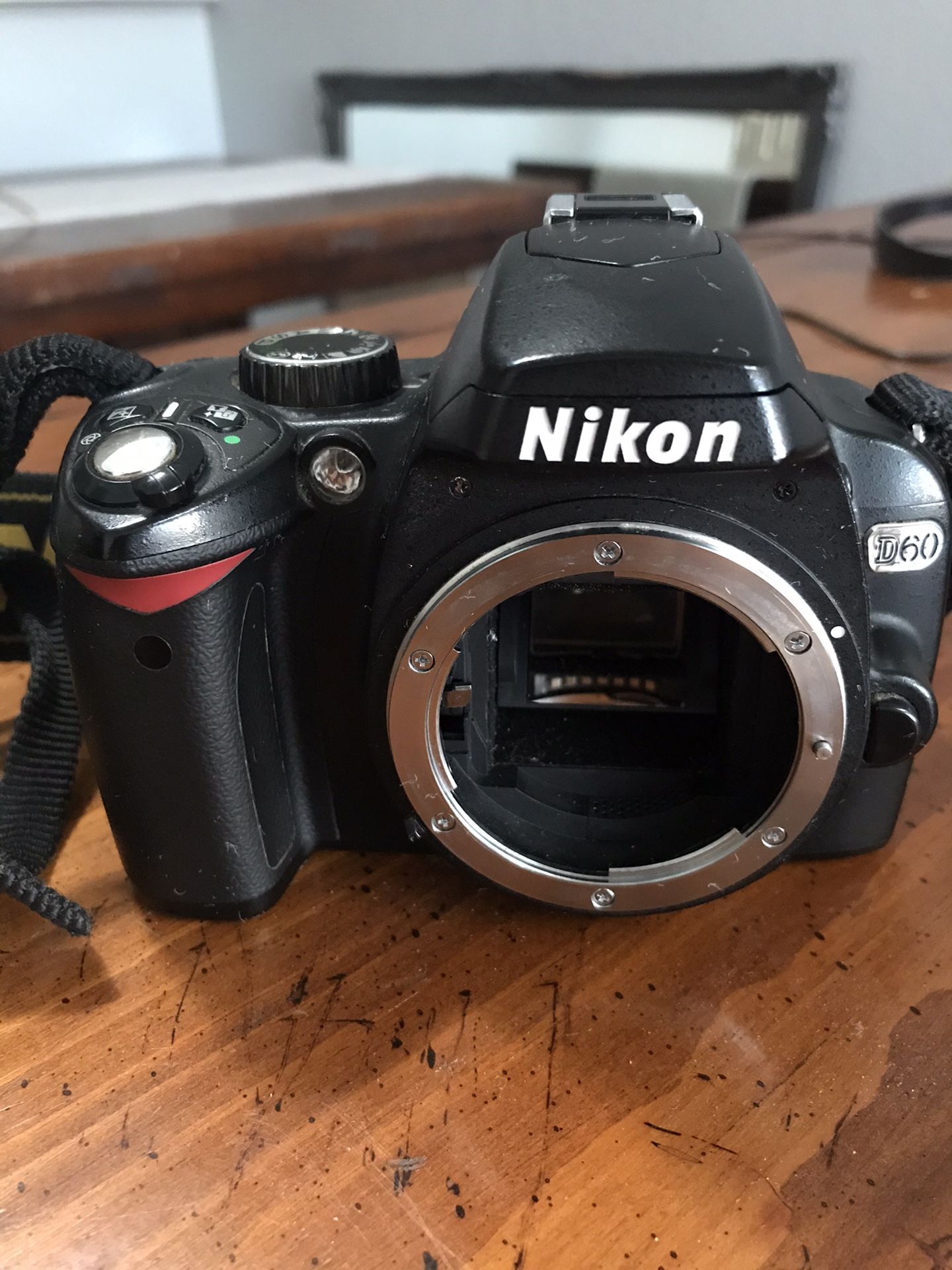 Nikon D60 with 18-55mm and 55-200mm lenses and a charger