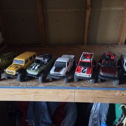 7  1/24 Axial RC Cars Plus A Remote Control Track