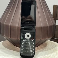 Alcatel One Touch 768T Flip Cellular Phone Black Bluetooth 2.0MP 2.4" Display