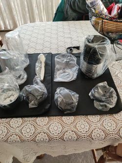 An 11 piece personal blender. Three cup sizes. Still in plastic.