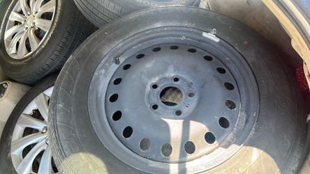 245/65/18Brand new spare rim and tire 5x127