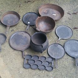 Large collection of cast iron pots kettles griddles 12 pieces