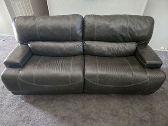 Ashley McCaskill Dual Power Reclining Sofa