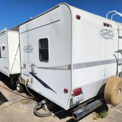 Tow Behind rv trailer. Current registration.  Everything works except slide out might need some assistance to retract.
