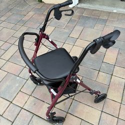 Like new 4 Wheel Rolator Type Walker