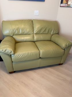 Beautiful all leather loveseat nearly new in a beautiful sage green