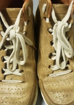 Gold/shimmer Girls size 6 Under Armor shoes