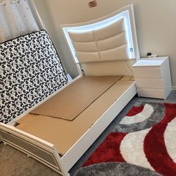 Queen size bed with leather and lighting  and bedside nightstand .NEW