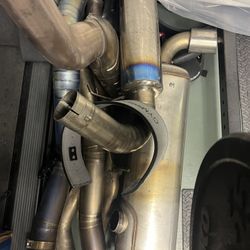 STOCK GR SUPRA MUFFLER/ EXHAUST PARTS (NEED WELDING BACK TOGETHER) 