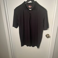 Pro player This black polo shirt offers a sleek and stylish look, perfect for any casual or semi-formal occasion. Made with high-quality materials, it