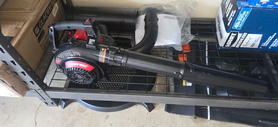 NEW TROYBILT 2 CYCLE GAS BLOWER / LEAF VACUUM WITH ATTACHMENTS 95$