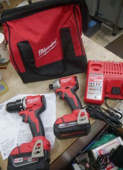 MILWAUKEE 3602-20 HAMMER DRILL 3651-20 IMPACT DRIVER 4AH 2AH BATTERY CHARGER  48-59-1812 CASE. NEW OUT OF BOX.