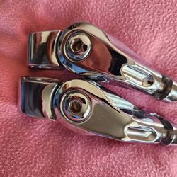 Harley Chrome Highway Foot Peg Clamps.
